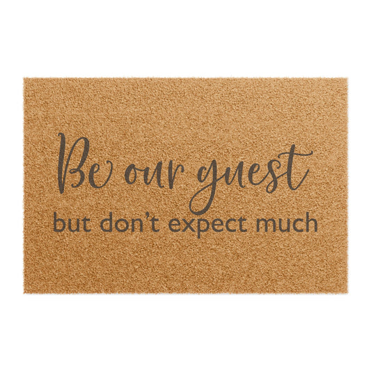 Be Our Guest Doormat – Funny Welcome Coir Mat (“Be our guest but don’t expect much”)